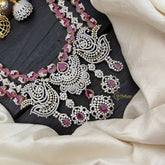Vriksham Peacock Features Dual Rows Heart-Shaped intricately AD Diamonds Bridal Haram-Red-G20216